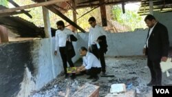 A team of fact-finding group lawyers from Delhi, who are members of the umbrella organization of Lawyers for Democracy, visiting a mosque in Panisagar, Tripura, Oct. 31, 2021. The mosque had been burnt by suspected Hindu activists in the third week of October.