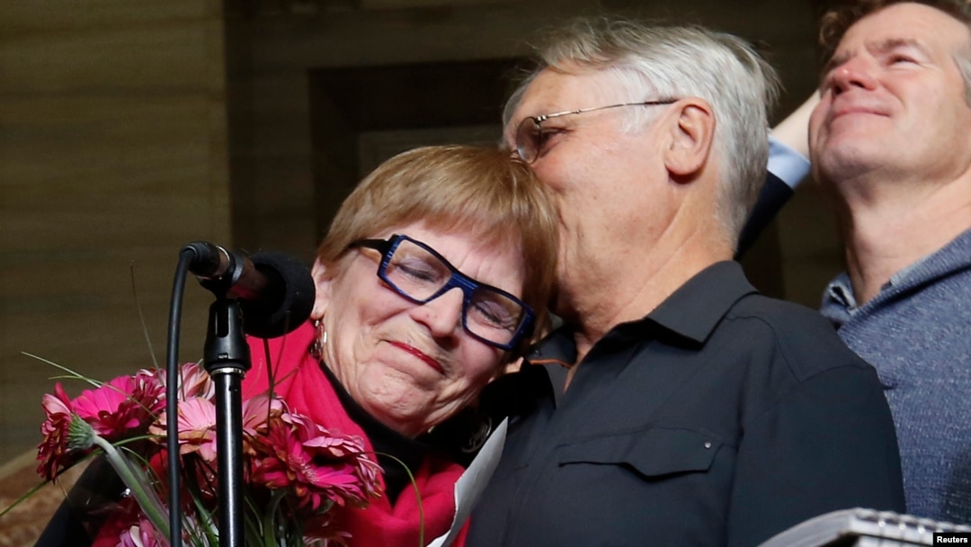 FILE — Lee Carter, whose mother traveled to Switzerland to end her life in 2010, speaks to journalists at the Supreme Court of Canada in Ottawa, Feb. 6, 2015. Doctor-assisted suicide has been available in Canada since 2016 for individuals whose death is "reasonably foreseeable."