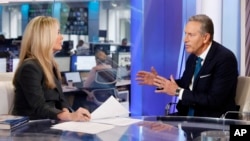 Former Starbucks CEO Howard Schultz is interviewed by FOX News Anchor Dana Perino for her "The Daily Briefing" program, in New York, Jan. 30, 2019. Schultz said he's flirting with an independent presidential campaign that would motivate voters turned off by partisan politics.