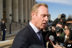 FILE - Acting Defense Secretary Patrick Shanahan speaks with reporters at the Pentagon, Jan. 28, 2019, in Washington.