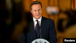 PM Inggris David Cameron Minggu (14/9) di London memberikan pernyataan setelah tewasnya pekerja bantuan Inggris David Haines yang dibunuh kelompok ISIS. 