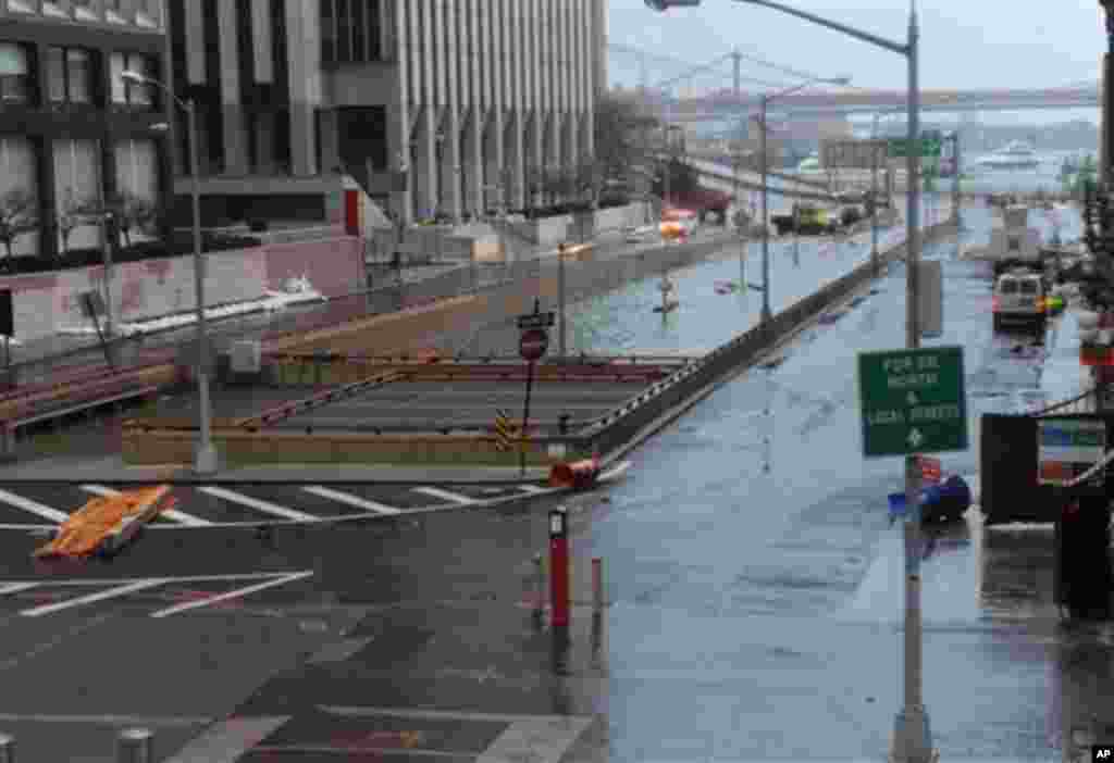 Water reaches the street level of the flooded Brooklyn Battery Tunnel, October 30, 2012, in New York. Superstorm Sandy arrived along the East Coast putting more than 7.5 million homes and businesses in the dark and causing a number of deaths.