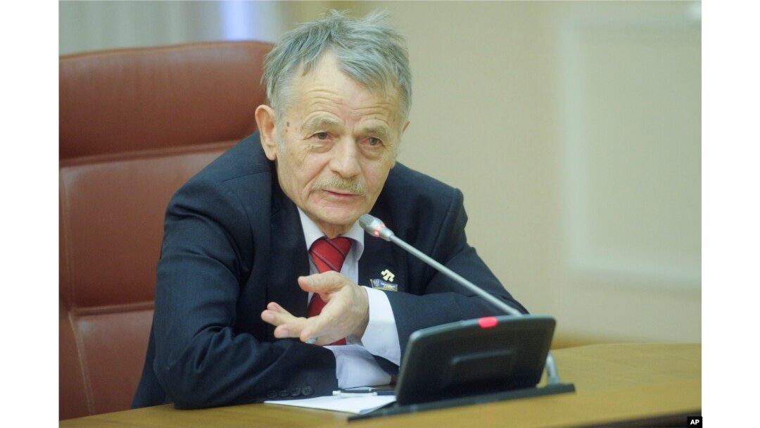 Crimean Tatar leader Mustafa Dzhemilev, takes part in the Ukrainian Cabinet session in Kiev, Ukraine, Monday, Nov. 23, 2015.