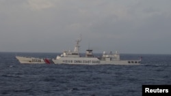 China Coast Guard vessel No. 31239 sails in the East China Sea near the disputed isles known as Senkaku isles in Japan and Diaoyu islands in China, in this handout photo taken and released by the 11th Regional Coast Guard Headquarters-Japan Coast Guard December 22, 2015. 