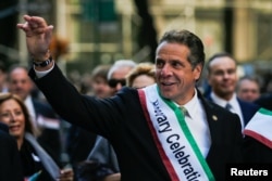 FILE - New York Governor Andrew Cuomo takes part in the 72nd Annual Columbus Day Parade in New York, Oct. 10, 2016.