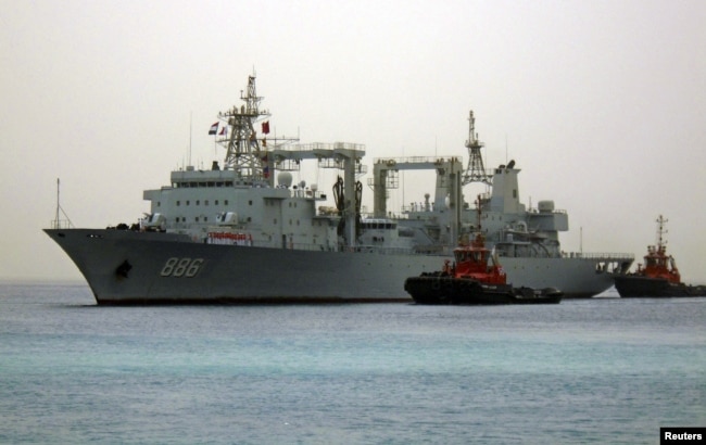 FILE - Chinese navy warships arrive at the seaport of Port Sudan, Aug. 25, 2015.