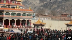 Tibetans gather at Nangchen county center grounds Wednesday for an all-day pray-in.