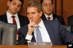 FILE - Arizona Senator Jeff Flake, who openly rooted against Donald Trump early in the nominating process, said of the latter's virtual wrap-up of the nomination, "I don't think fences need mending."