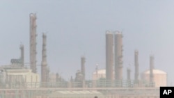 FILE - Oil refinery in Ras Lanouf, eastern Libya. 