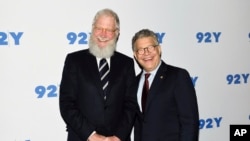 FILE - Sen. Al Franken, D-Minn., right, and former talk show host David Letterman arrive for their conversation at 92Y in New York, May 30, 2017.