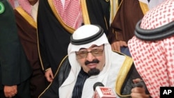 Saudi Arabia's King Abdullah speaks to Saudi media upon his arrival at Riyadh airport. King Abdullah unveiled a series of benefits for Saudis estimated to be worth $35 billion on his return home after three months abroad for medical treatment, February 23