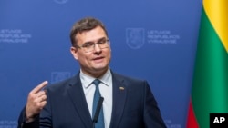 FILE - Lithuanian Defense Minister Laurynas Kasciunas speaks during a press conference in Vilnius, Lithuania, on Sept. 26, 2024. Kasciunas urged Europe on Nov. 9, 2024, to find common interests with which it can cooperate with U.S. President-elect Donald Trump.