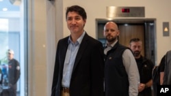 Canadian Prime Minister Justin Trudeau walks through the lobby of the Delta Hotel on Nov. 30, 2024, in West Palm Beach, Florida, a day after his meeting with U.S. President-elect Donald Trump.