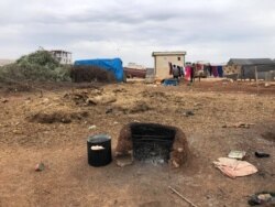 In the countryside of Idlib, families have been fleeing bombs for months, and many are now living out in the open, cooking on ovens they made themselves, March 1, 2020. (Courtesy of aid workers)