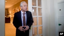 FILE - White House trade adviser Peter Navarro arrives for a news conference between President Donald Trump and Japanese Prime Minister Shinzo Abe in the Rose Garden at the White House, June 7, 2018, in Washington. 