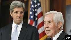 Senate Foreign Relations Committee Chairman Sen. John Kerry, D-Mass., left, and the committee's ranking Republican, Sen. Richard Lugar, R-Ind., take part in a news conference after the Senate's ratification of the New START Treaty, on Capitol Hill in Wash