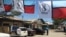 Political signs and flags around Dar es Salaam promoting Tanzanian opposition party Chadema in preparation for elections Sunday. Oct. 23, 2015. (Photo: Jill Craig/ VOA)