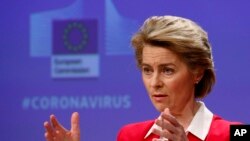 FILE - European Commission President Ursula von der Leyen speaks during a media conference, detailing EU efforts to limit the economic impact of the Covid-19 outbreak, at EU headquarters in Brussels, April 2, 2020. 
