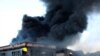 A factory burns on the outskirts of Durban, South Africa, July 14, 2021. Former president Jacob Zuma's incarceration for contempt of court, sparked off the worst violence South Africa has seen since the nation achieved democracy in 1994.