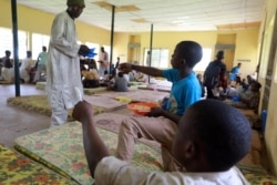 Children rescued from captivity by police are fed by officials at the Hajj transit camp in Kaduna, Nigeria, Sept. 28, 2019.
