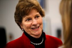 Sen. Jeanne Shaheen, D-NH, speaks to a reporter at the Portsmouth Naval Shipyard, May, 3, 2019, in Kittery, Maine.