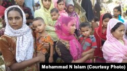 Some of the Hindu women refugees, who, after fleeing violence in their village in Rakhine, have arrived Bangladesh Aug. 28, 2017. 