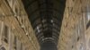 Galleria Vittorio Emanuele is seen in Milan, with people wearing mandatory protective masks. (Sabina Castelfranco/VOA)