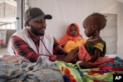 FILE—Sudanese Children suffering from malnutrition are treated at an MSF clinic in Metche Camp, Chad, near the Sudanese border, April 6, 2024.