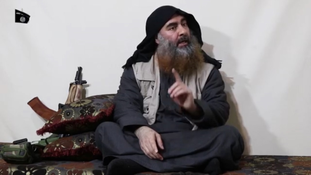 FILE - Abu Bakr al-Baghdadi purportedly appears for the first time in five years in a propaganda video in an undisclosed location, in this undated TV grab taken from video released April 29 by Al-Furqan media.
