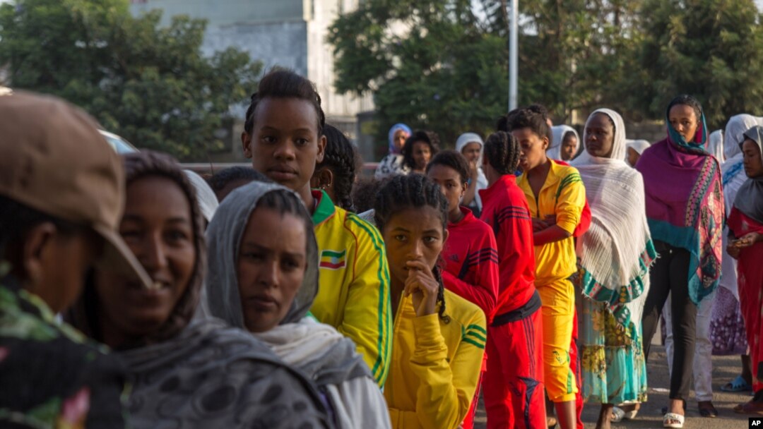 FILE - Voters queue early in the morning to cast their votes in Ethiopia's general election, in Addis Ababa, Ethiopia, May 24, 2015.