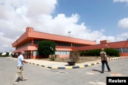 FILE - An exterior view of the departure lounge at the airport in Sirte, Sept. 29, 2011.