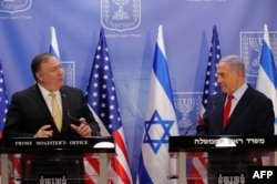 U.S. Secretary of State Mike Pompeo (left) and Israeli Prime Minister Benjamin Netanyahu deliver a joint statement during their meeting in Jerusalem on March 20, 2019.
