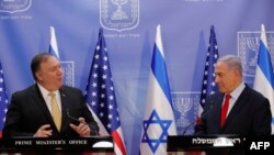 U.S. Secretary of State Mike Pompeo (left) and Israeli Prime Minister Benjamin Netanyahu deliver a joint statement during their meeting in Jerusalem on March 20, 2019.