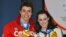 Canadian ice dancers Scott Moir and Tessa Virtue with their gold medals