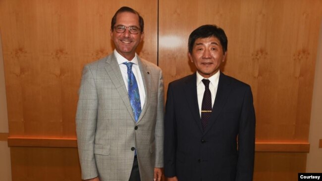 台湾卫生福利部部长陈时中（右）于2018年至华府拜访美国卫生及公共服务部部长阿扎尔（Alex Azar）（左）。（图片取自Alex Azar 推特）