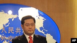 Anti-President Mohamed Mosi protesters hold up their shoes after a televised speech by Mr. Morsi, Tahrir Square in Cairo, July 3, 2013.