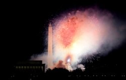 Fireworks display over the National Mall at the conclusion of the Celebrating America event at the Lincoln Memorial after the inauguration of Joe Biden as the 46th President of the United States in Washington, D.C., Jan. 20, 2021.