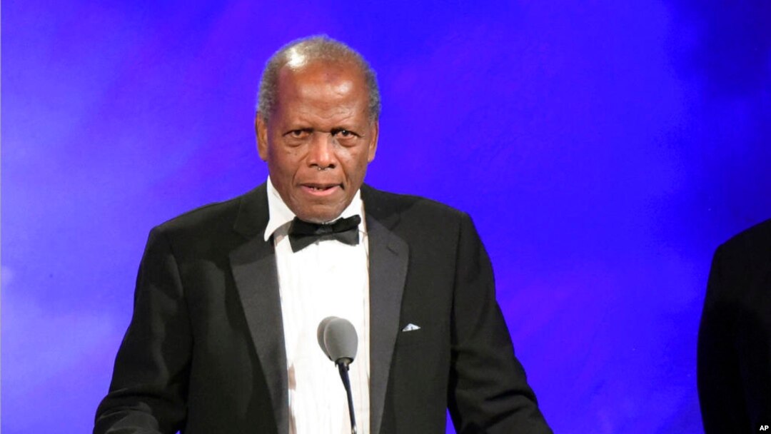 FILE - Sidney Poitier speaks at the 2016 Carousel Of Hope Ball in Beverly Hills, Calif., Oct. 8, 2016.