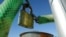 A padlock hangs outside the Tae Kwon Do and Handball stadium at the Faliro Coastal Zone, near Athens, Aug. 8, 2005 (AP).