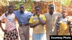 Photo of five people who escaped the LRA and went to a Safe Reporting Site in the Central African Republic in November 2012. 