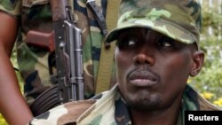 FILE - General Sultani Makenga, military leader of the M23 rebels, addresses the media in Bunagana, in eastern Democratic Republic of Congo.