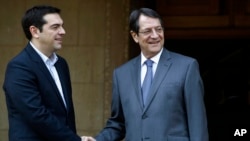 Президент кіпру Анастасіадес і прем'єр-міністр Греції Ципрас, 2 лютого 2015 р.