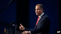 NASA Administrator Jim Bridenstine speaks before introducing Vice President Mike Pence at the opening ceremony of the International Astronautical Congress, Oct. 21, 2019, in Washington.