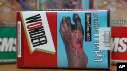 Bao thuốc lá bán ở Thái Lan với hình ảnh cảnh báo về bệnh