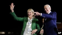 Democratic presidential candidate former Vice President Joe Biden, right, and his wife Jill attend a primary election night rally March 3, 2020, in Los Angeles.