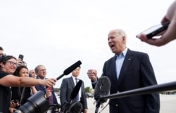 President Joe Biden talks to reporters prior to boarding Air Force One as he departs on travel to attend the G-7 Summit in England, the first foreign trip of his presidency, from Joint Base Andrews, Maryland, June 9, 2021.