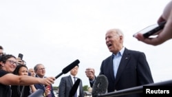 President Joe Biden talks to reporters prior to boarding Air Force One as he departs on travel to attend the G-7 Summit in England, the first foreign trip of his presidency, from Joint Base Andrews, Maryland, June 9, 2021.