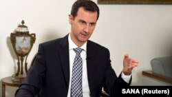 Le président Bashar al-Assad lors d'une interview au quotidien espagnol El Pais à Damas, le 20 février 2016.