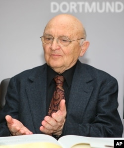 Israeli author Aharon Appelfeld gestures during the awarding ceremony of the Nelly-Sachs award for his career in Dortmund, Germany, Dec. 4, 2005.