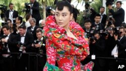 Actress Gong Li for the opening ceremony and the screening of the film La Tete Haute (Standing Tall) at the 68th international film festival, Cannes, southern France, Wednesday, May 13, 2015. (AP Photo/Thibault Camus)